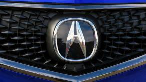 A shot of the grille and logo design on a blue Acura MDX midsize luxury SUV at the 2020 Sundance Film Festival