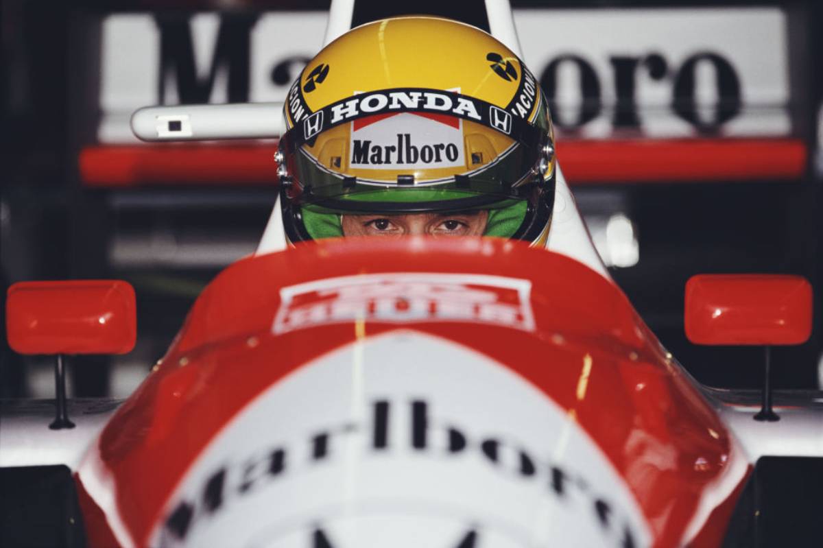 Ayrton Senna in his car before a race.