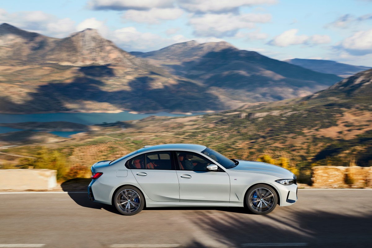 2023 BMW 3 Series with a Twin Scroll  turbo V8 driving at speed