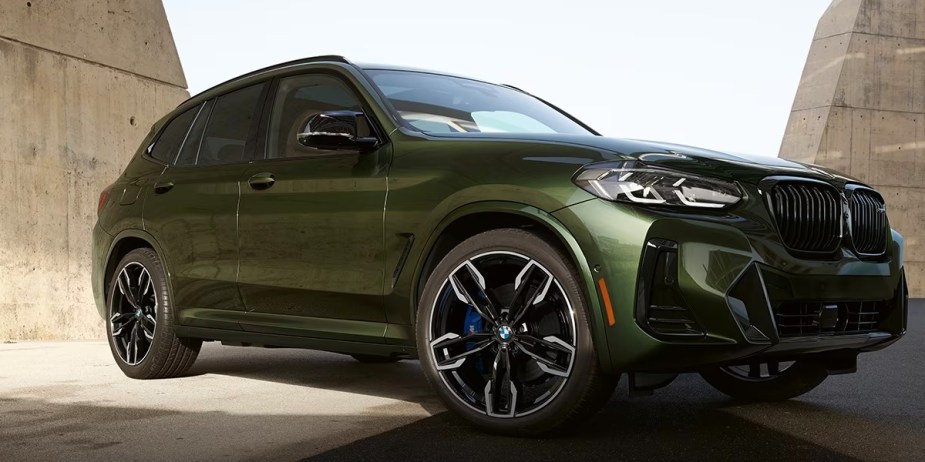 A green 2023 BMW X3 luxury small SUV. 