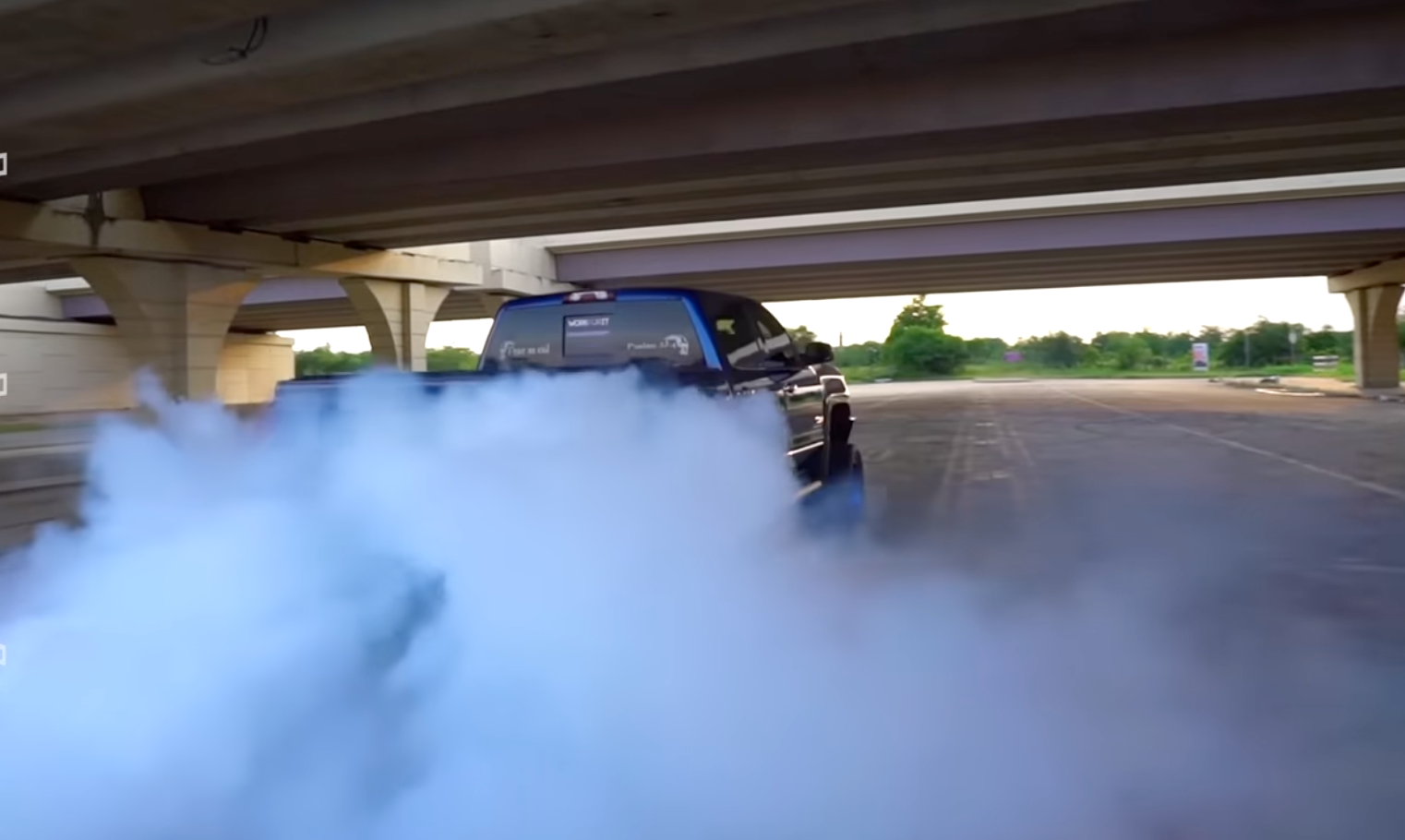 Chevy Silverado with 1,000 hp doing a burnout.