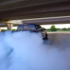 Chevy Silverado with 1,000 hp doing a burnout.