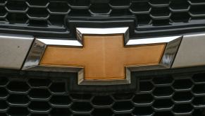 The Chevrolet logo seen on a parked Chevy vehicle in Krakow, Poland
