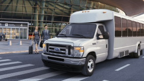 A 2024 Ford E-Series Cutaway model transformed into a transportation passenger vehicle at an airport