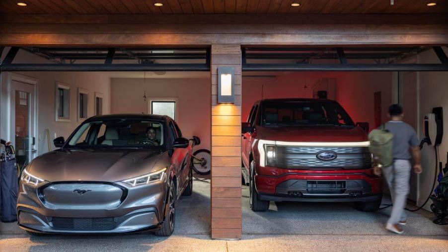 Ford's Mustang Mach-E compact SUV and F-150 Lighting full-size pickup truck electric vehicles in a home garage