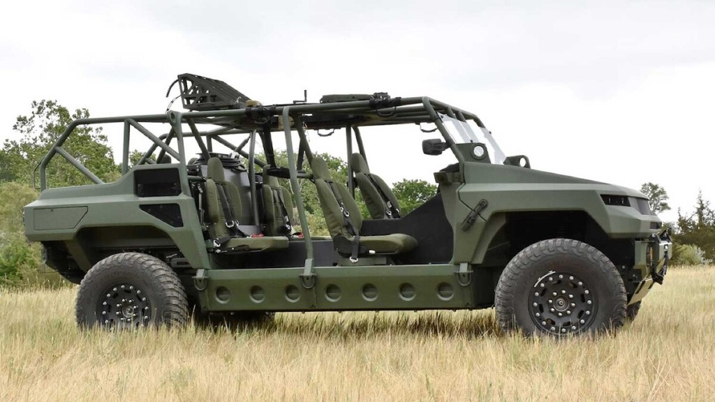 GM Defense GMC Hummer EV mil-spec concept in grassy field