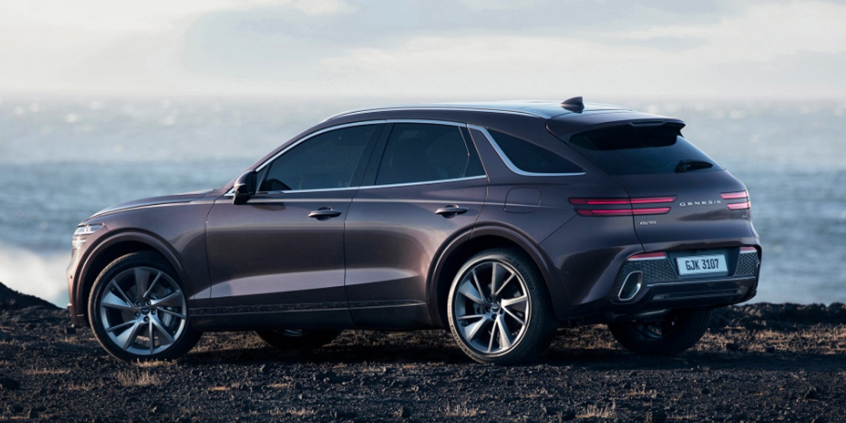 The rear of a gray 2023 Genesis GV70 small luxury SUV.