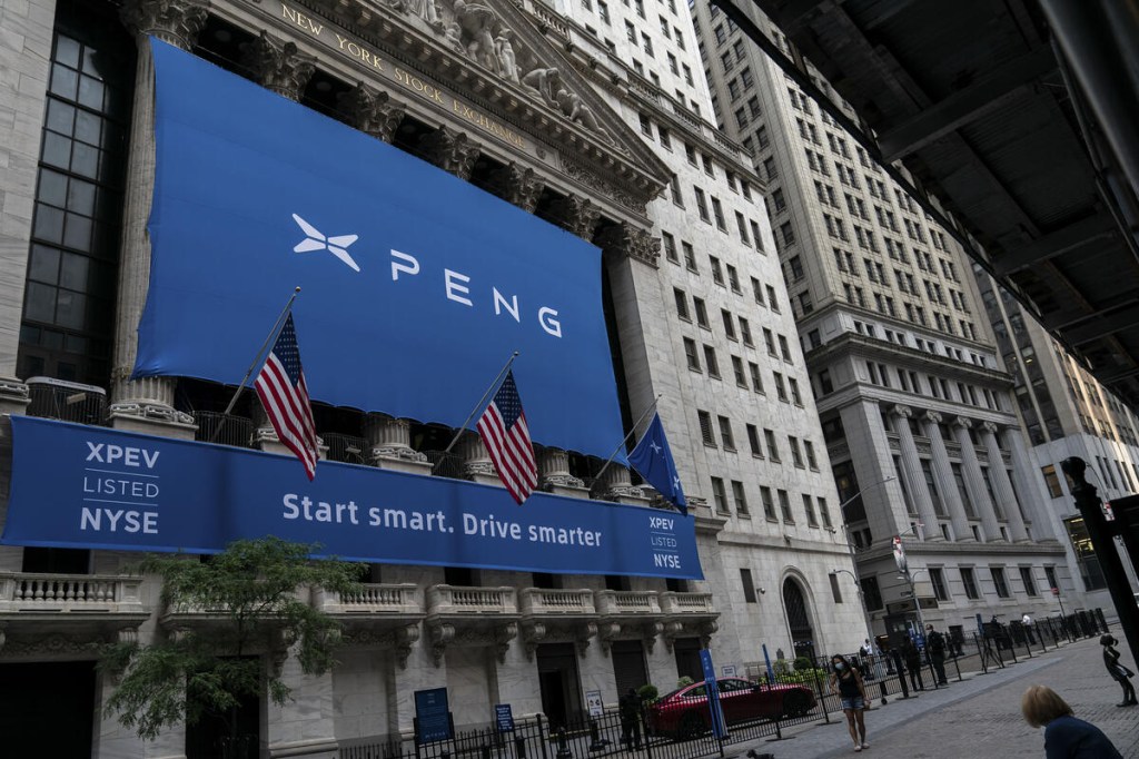 Chinese manufacturer X-Peng flying blue banner at the NY Stock Exchange