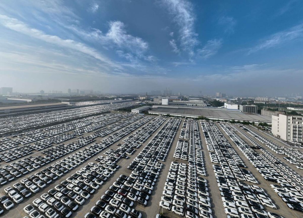 Assembled cars sitting on Chinese dock