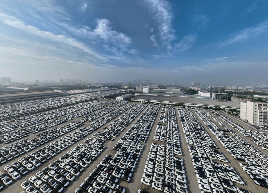 Assembled cars sitting on Chinese dock 