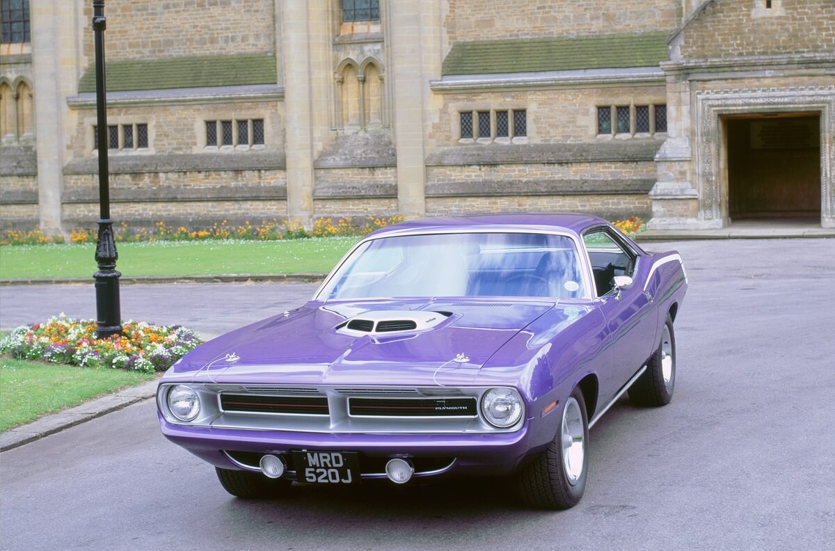 A purple 1970 Plymouth Hemi 'Cuda shows off its bright color pallet and shaker hood.