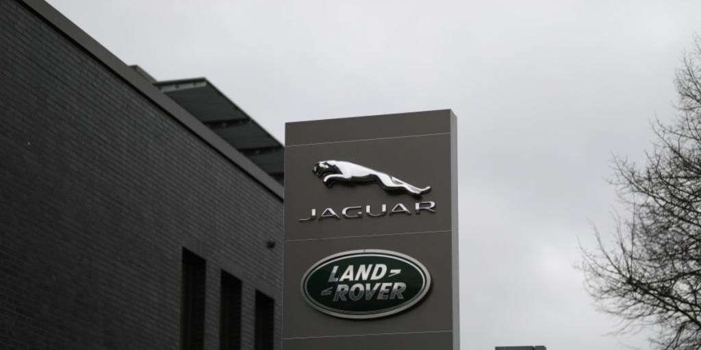 Jaguar Land Rover signs on building