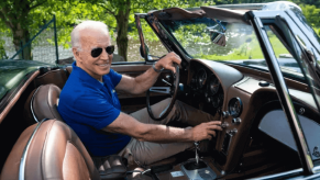 President Joe Biden smiles in his 1967 Chevrolet Corvette Stingray.