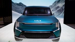 The Kia EV9 all-electric SUV model grille on display at the 2022 New York International Auto Show