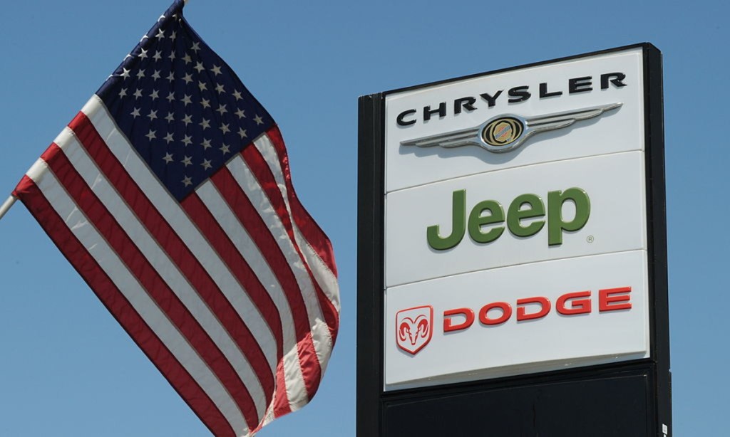 Chrysler Jeep Ram dealer sign with American flag