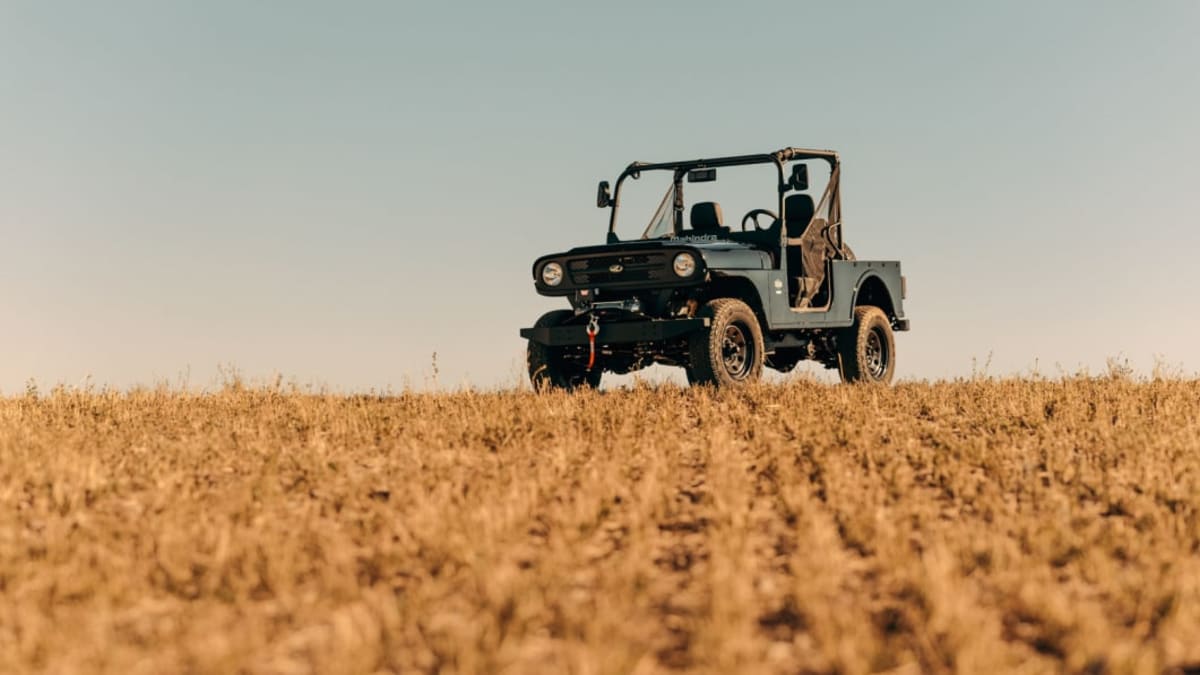 Mahindra Roxor parked in a grass field