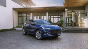 The 2024 Buick Envista Avenir compact SUV model in the Ocean Blue Metallic paint color option