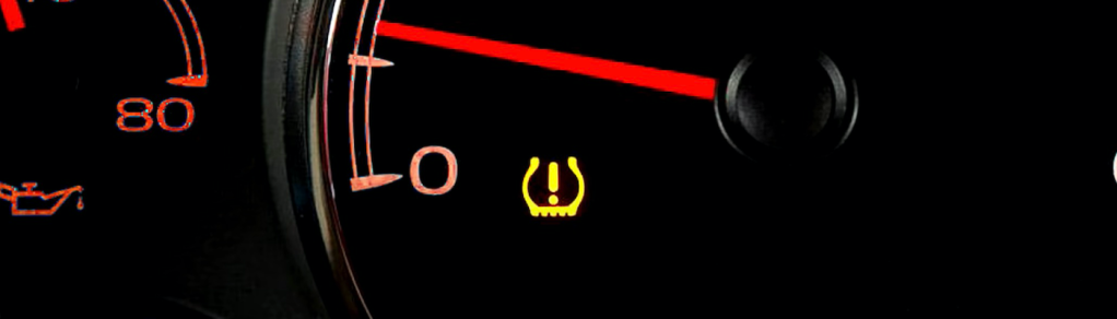 The TPMS Sensor illuminated on the dashboard of a car