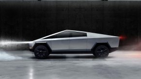 A side view of the Tesla Cybertruck on a stage