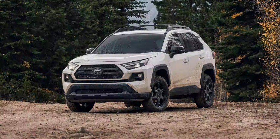 A white 2023 Toyota RAV4 small SUV is parked outdoors. 