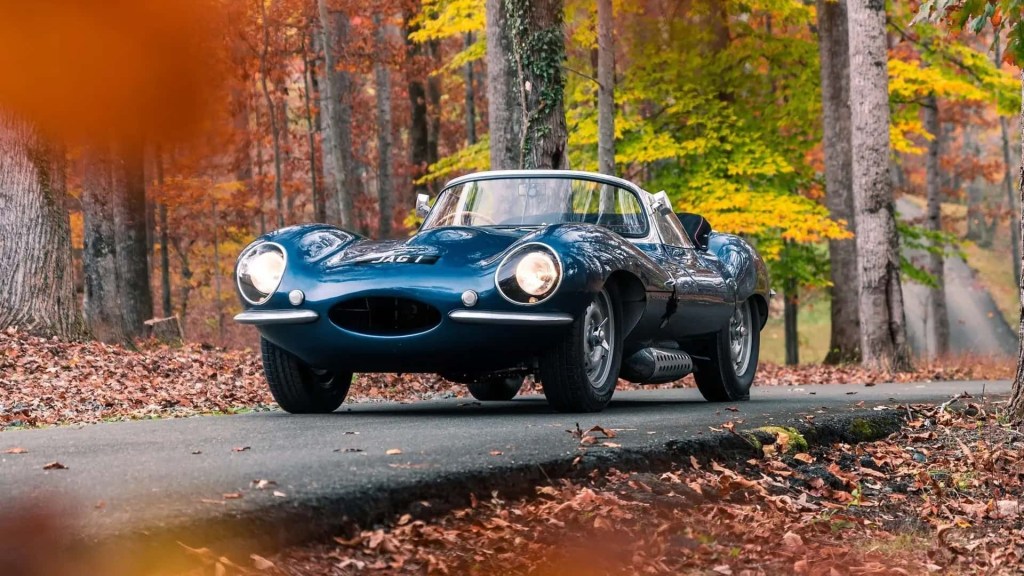 Jaguar XKSS 707 parked on the road. This is one of the most beautiful cars ever made.