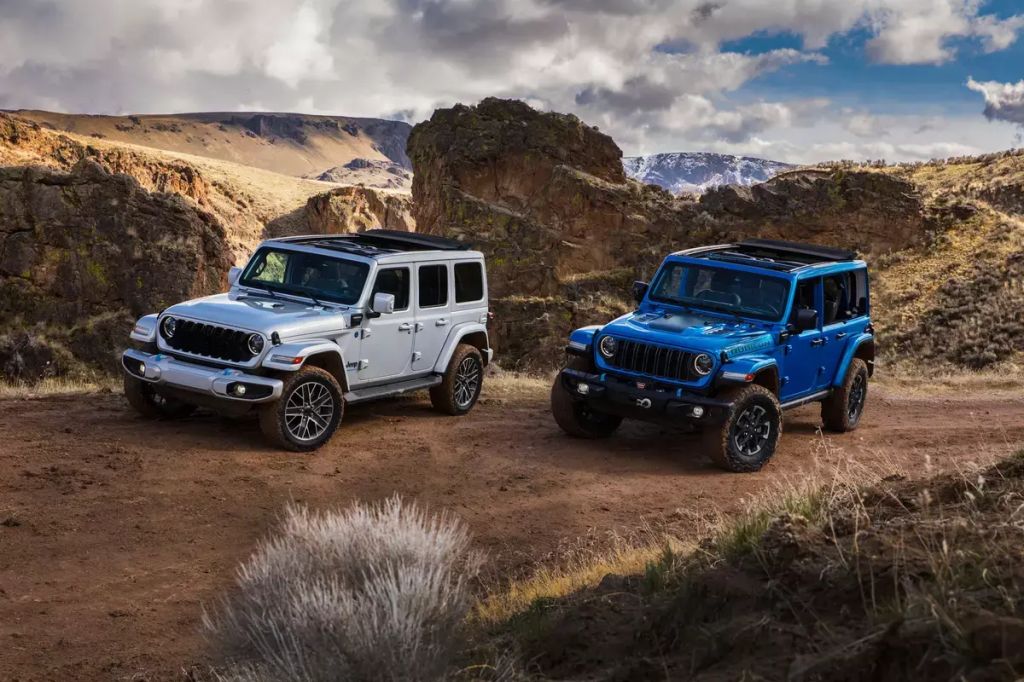 Blue and silver 2023 Jeep Wrangler 4xe SUVs