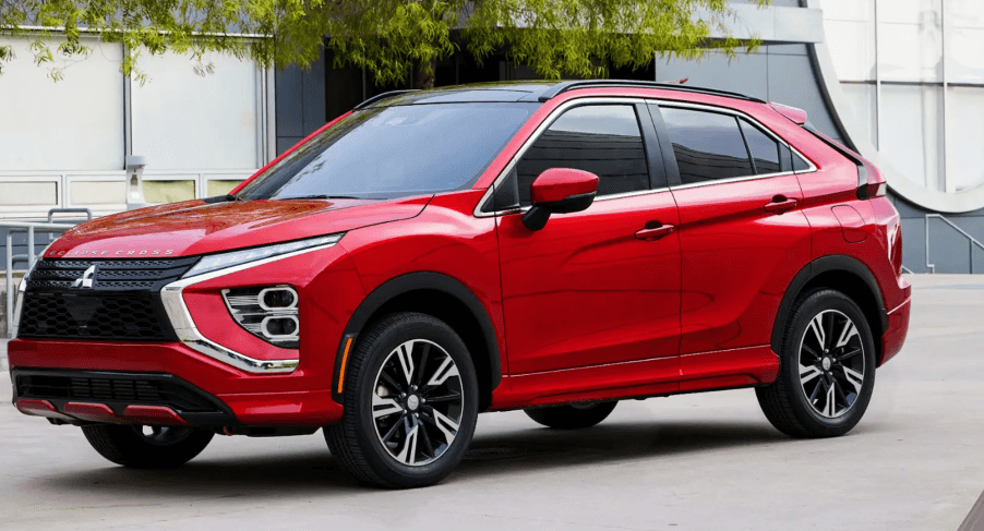 A 2024 Mitsubishi Eclipse Cross compact crossover SUV model in the Red Diamond paint color option