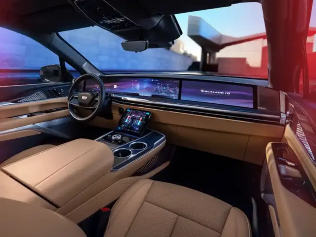 Tan 2025 Cadillac Escalade IQ BEV SUV dash and screens