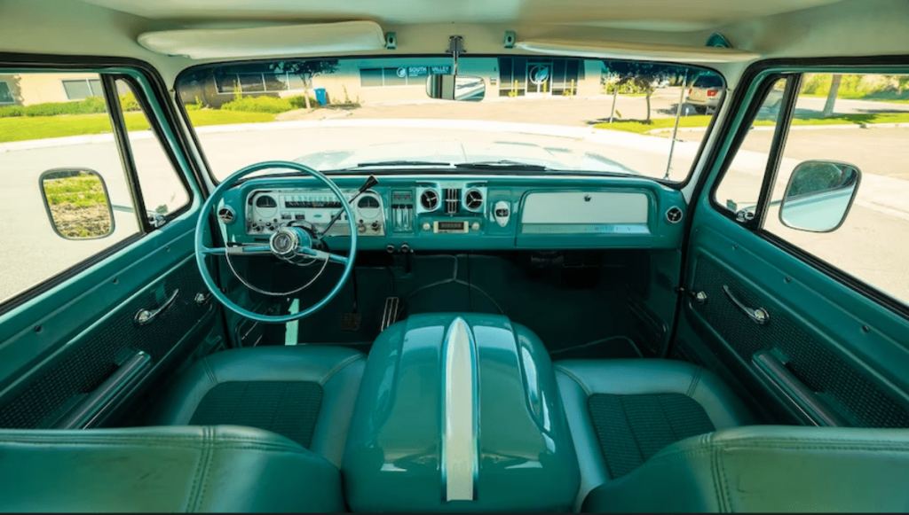 The teal-green interior of the custom 1966 Chevy C10