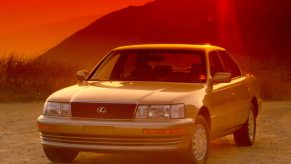 A Lexus LS400 on display at sunset.