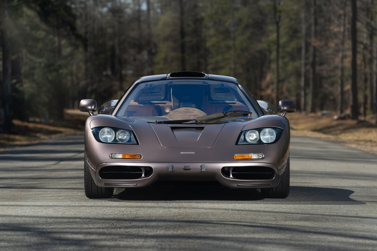 A 1994 McLaren F1 Supercar sitting in the road, front