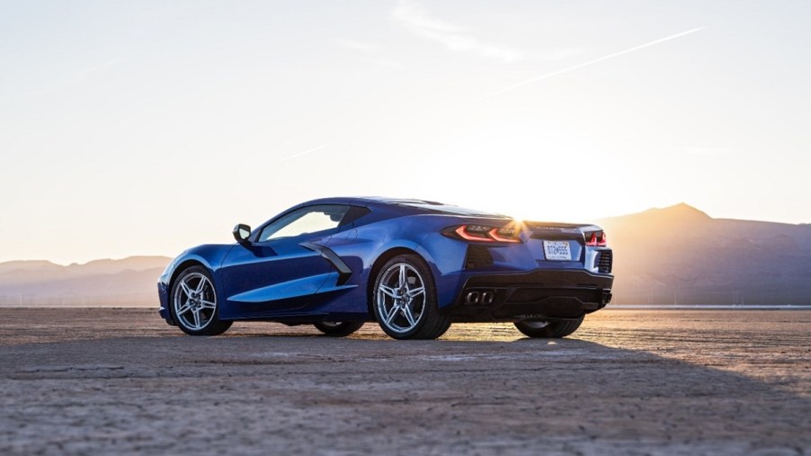 A blue Chevrolet Corvette shows off its rear-end styling.