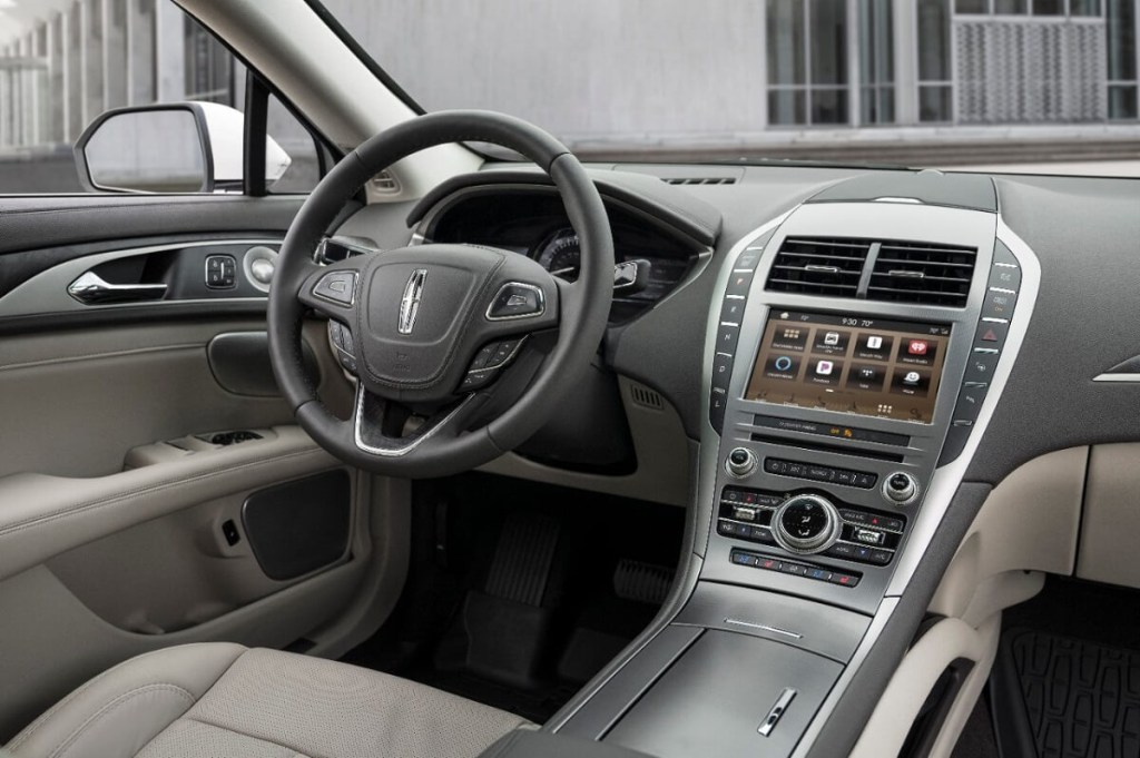 An 2020 Lincoln MKZ displays its leather interior and infotainment screen.