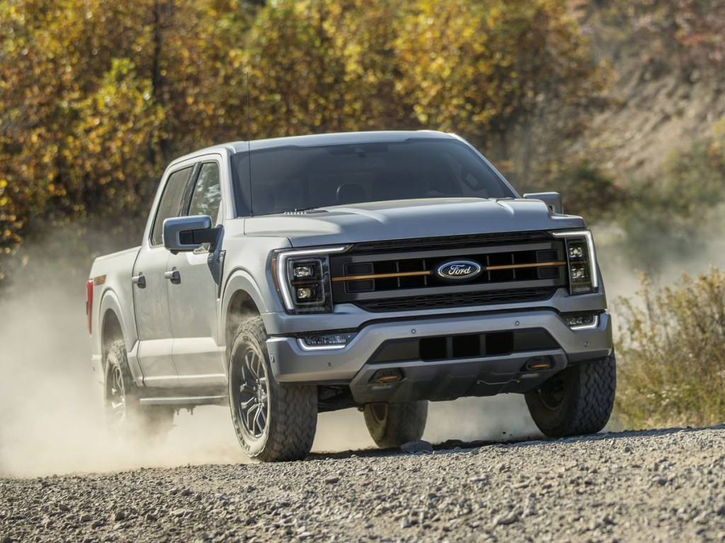 The 2023 Ford F-150 off-roading over gravel 