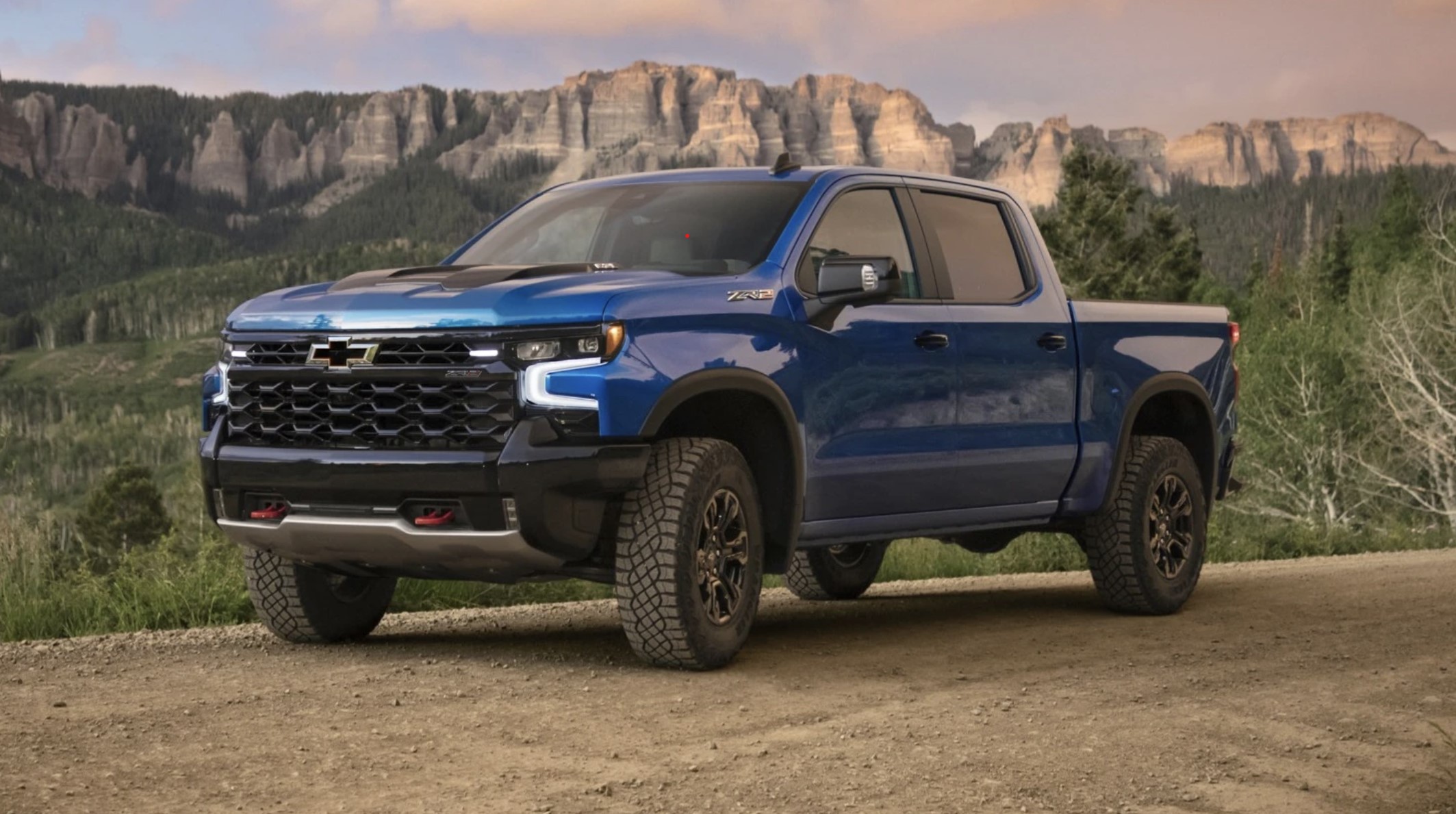 The 2023 Chevy Silverado off-roading on a dirt trail