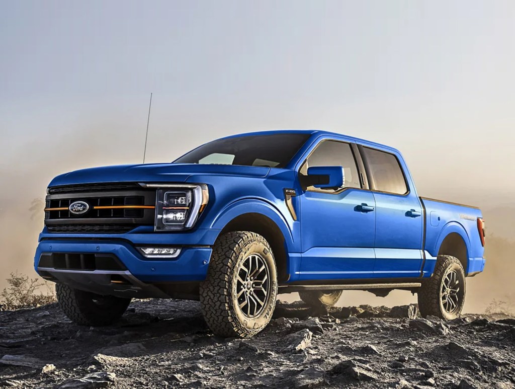 The 2023 Ford F-150 crawling over rocks