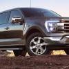 The 2023 Ford F-150 PowerBoost Hybrid off-roading in dirt