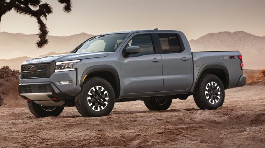The 2023 Nissan Frontier parked in the desert sand