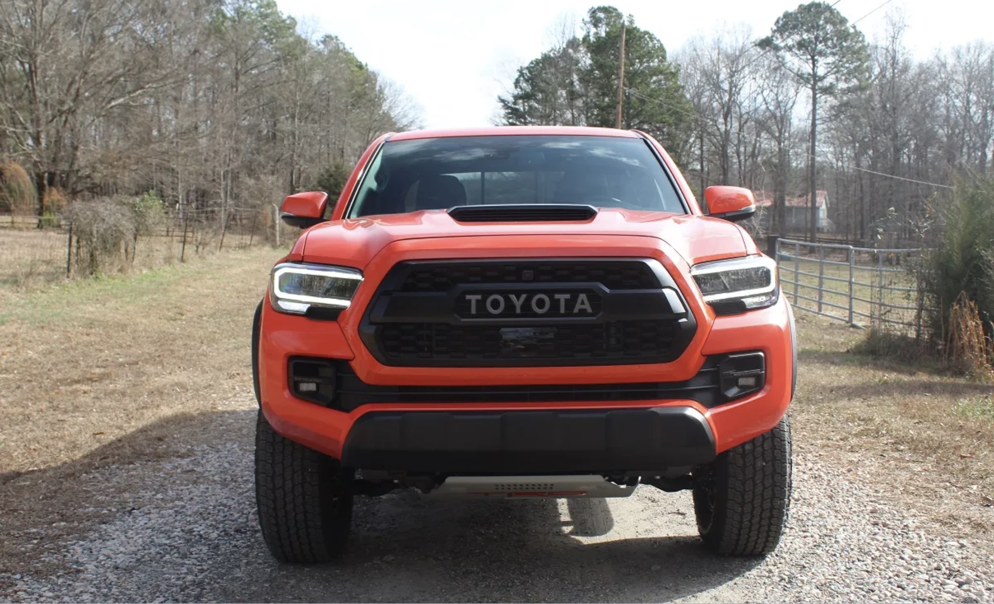 The 2023 Toyota Tacoma off-roading on a gravel trail