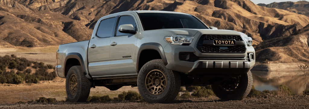 The 2023 Toyota Tacoma off-roading in the dirt
