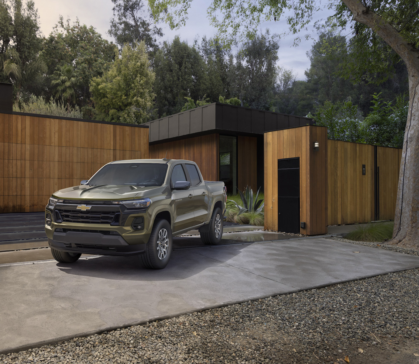 The 2023 Chevrolet Colorado parked in front of a home. The Chevy Colorado sales have bounced back recently.