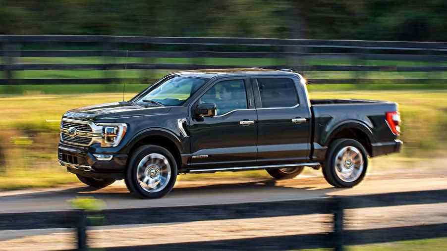 The 2023 Ford F-150 driving down the road