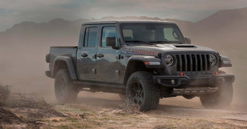 The 2023 Jeep Gladiator kicking up sand