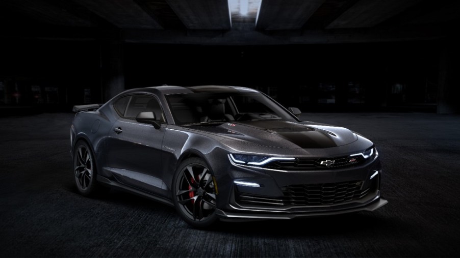 A 2024 Chevrolet Camaro SS shows off its dark aesthetic and prominent splitter.