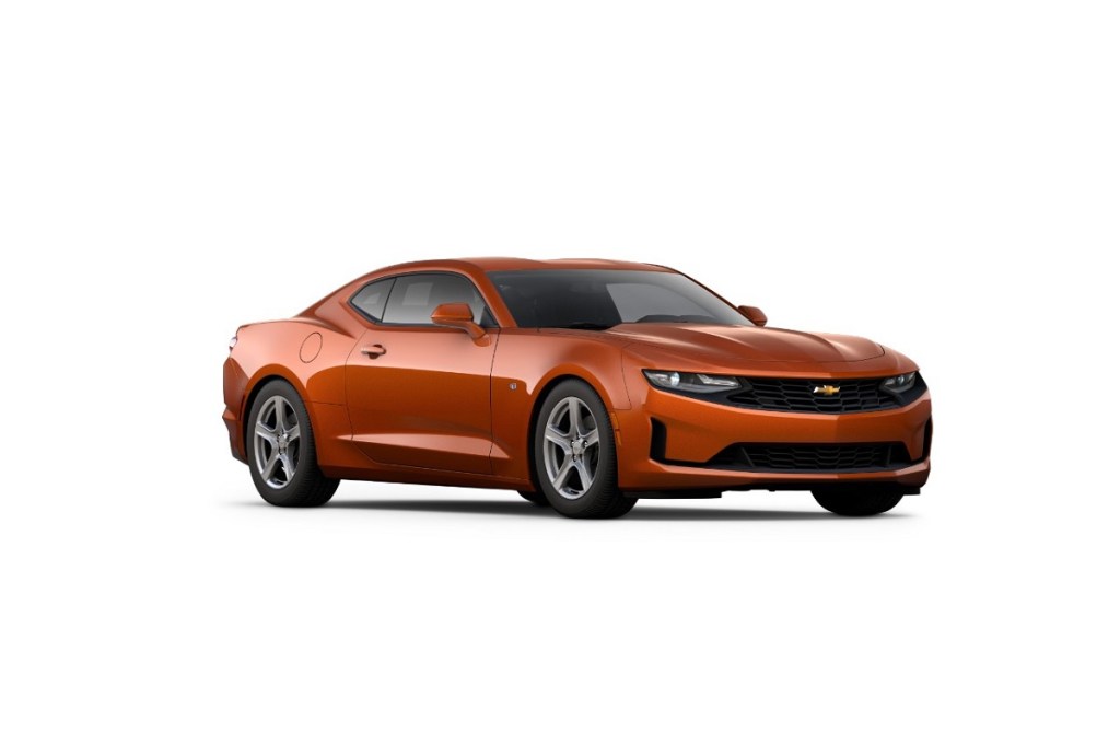 A 6th gen Chevrolet Camaro shows off its orange paintwork and angular fascia.