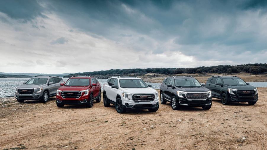 The 2024 GMC Terrain (L to R) SLE, SLT, AT4, Denali, and Elevation Edition trim level models