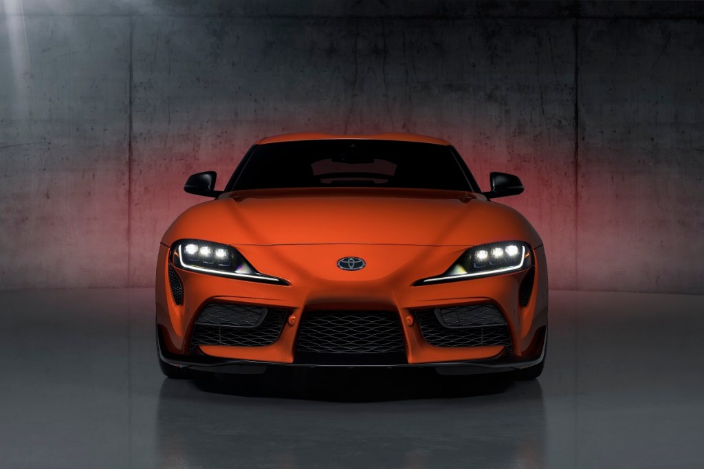 An orange 2024 Toyota GR Supra 3.0 shows off its front-end styling.
