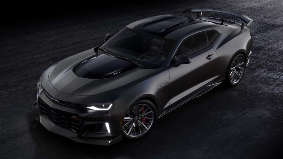 Overhead front 3/4 view of 2024 Chevrolet Camaro ZL1 Collector’s Edition in Panther Black Matte. 2023 Chevy Camaro trims are available in that paint color.