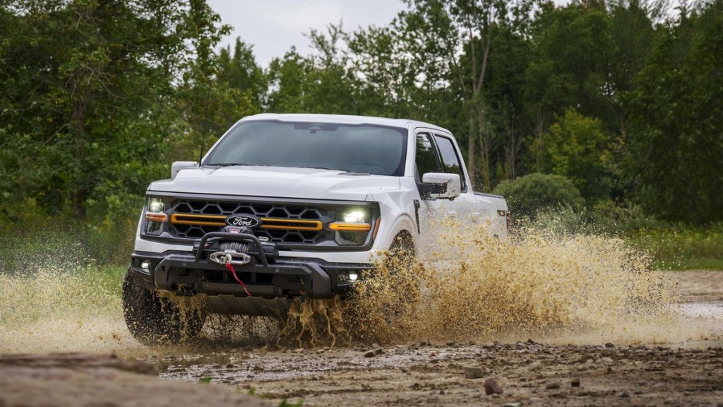 The 2024 Ford F-150 Tremor off-roading in mud