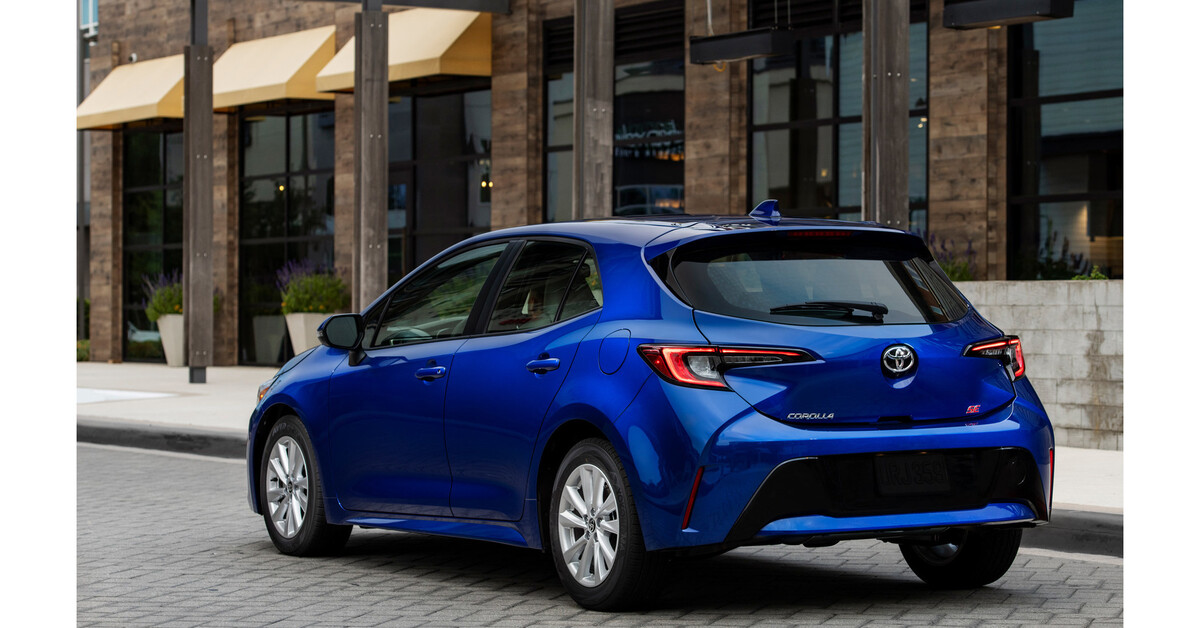 Blue 2023 Toyota Corolla hatchback next to building